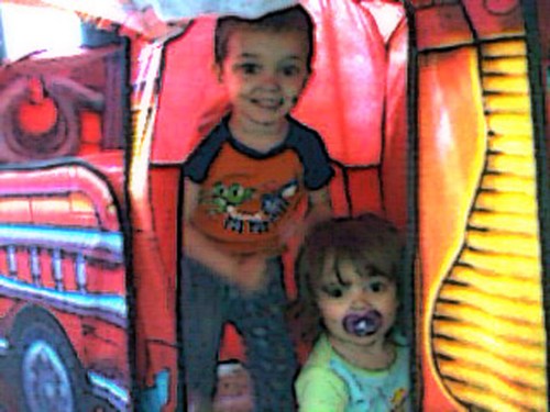 2013_07 13 W&A in firetruck enhanced posterized