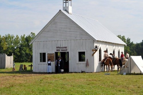 Cowboys outside church