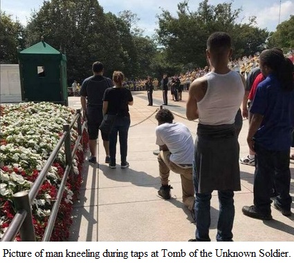 2017_09 Man kneeling for taps at Unknown tomb